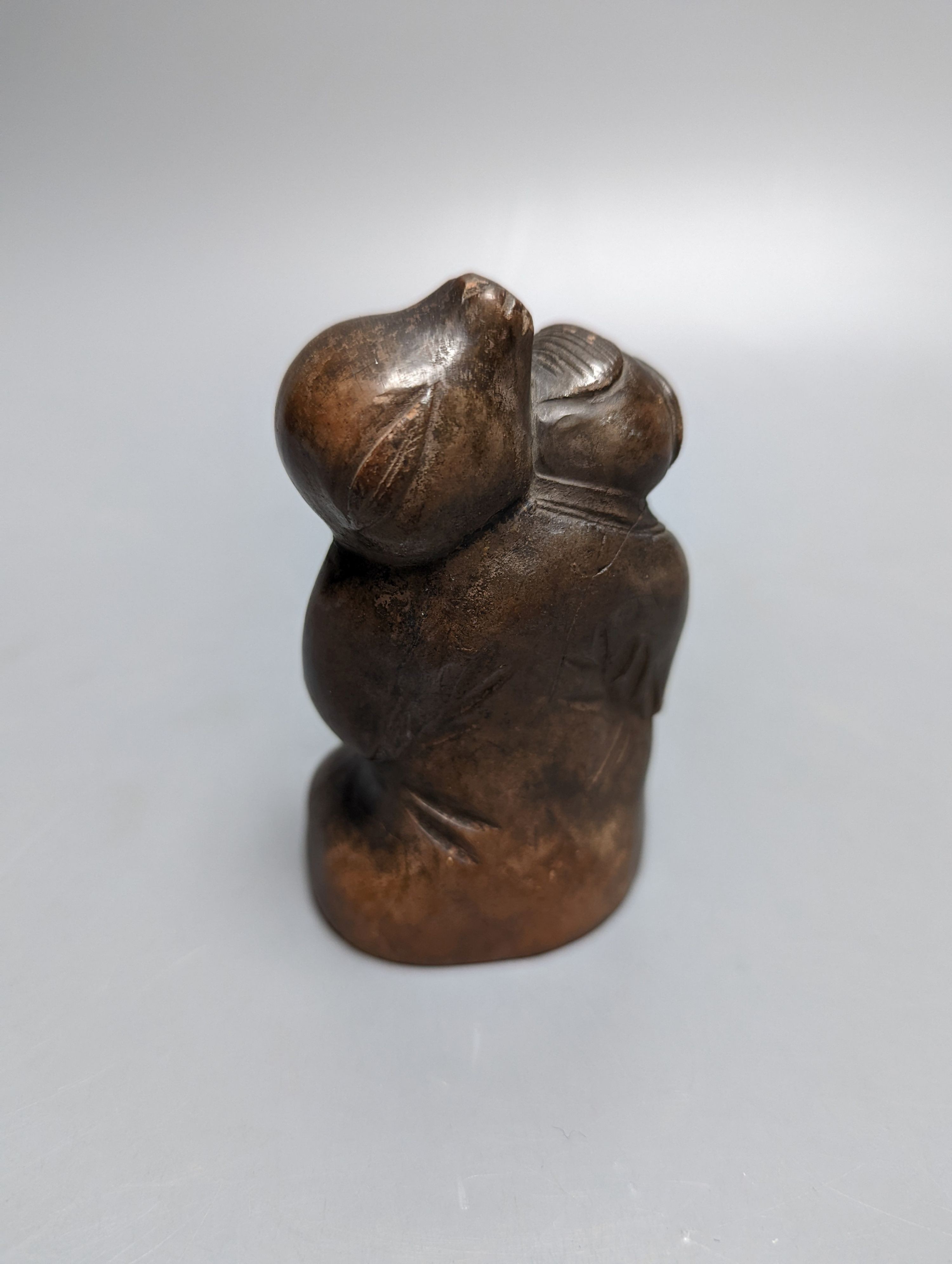 A late 19th/early 20th century Chinese pottery figure, 9.5cm impressed maker’s mark